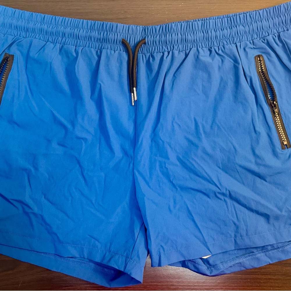 XXL Mens Blue Swim Shorts with Zipper Pockets and nylon mesh.